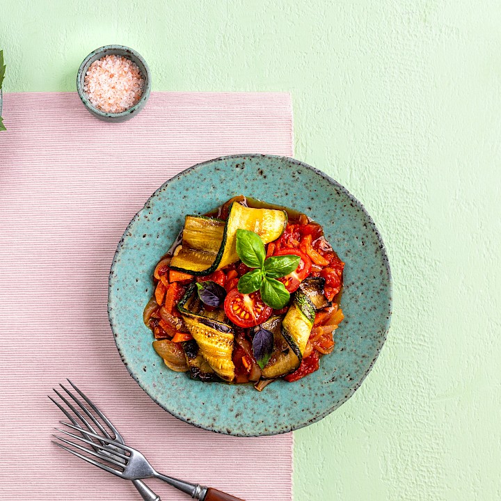 Courgettes et tomates sautées à l'ail et au persil